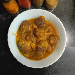 A picture of Soyabean Musoor Dal Kofta Curry - Bengali style.
