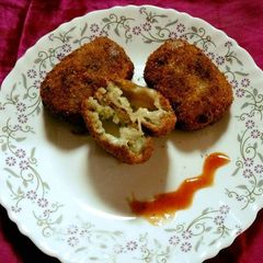 A picture of Poha potato patties with cheese.