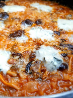 Una foto de Arroz cremoso con camagrocs y gorgonzola