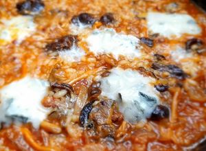 Una foto de Arroz cremoso con camagrocs y gorgonzola