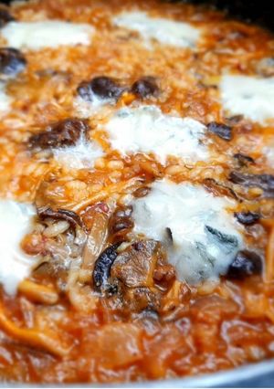 Una foto de Arroz cremoso con camagrocs y gorgonzola