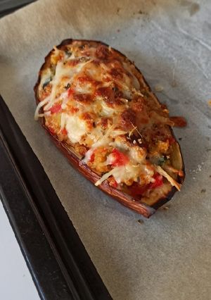 Una foto de Berenjenas rellenas de verduras y quinoa