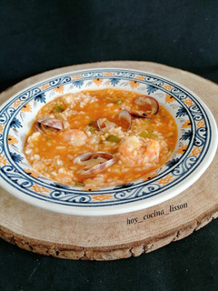 Una foto de Arroz caldoso con langostinos y almejas