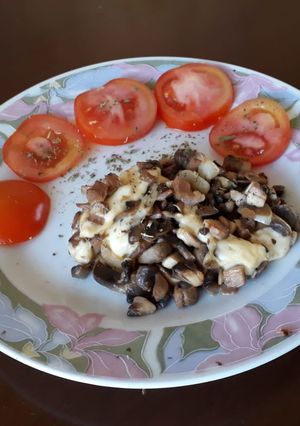 Una foto de Champiñones con queso