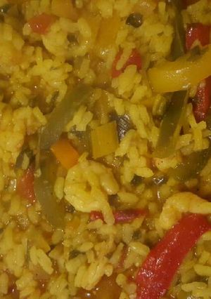 Una foto de Arroz con gambas