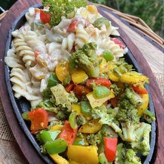 A picture of Chessy white sauce pasta.