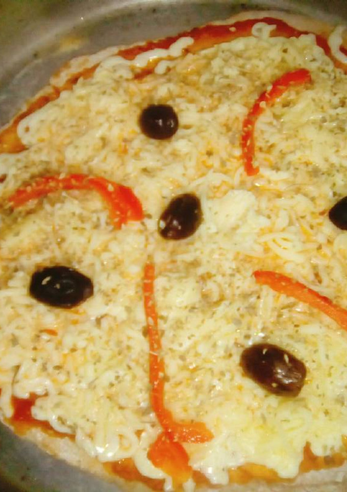 Una foto de Pizza de harina integral... Liviana y riquísima!!! 😀👏👏👏