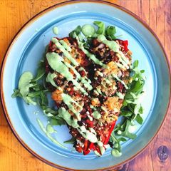 A picture of Chilli beef stuffed peppers / kefir, avocado, coriander dressing.