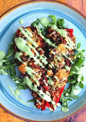 A picture of Chilli beef stuffed peppers / kefir, avocado, coriander dressing.