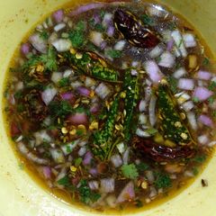 A picture of Pachipulusu (tamarind soup).