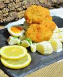 Schnitzel de mollejas y ensalada de papa
