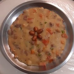 A picture of Semolina veggie upma.