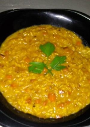 Una foto de Guiso de arroz, con tomate