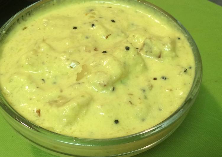 Get Breakfast of Pineapple Pachadi ( Pineapple in Coconut- yogurt sauce)