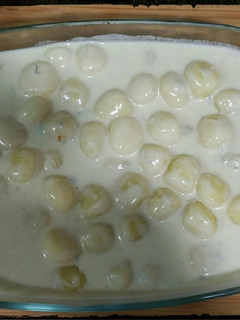 Una foto de Ñoquis al queso