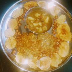 A picture of Lauki kuttu poori with aloo curry.