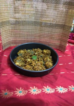 A picture of Baked kofta chole masala curry.