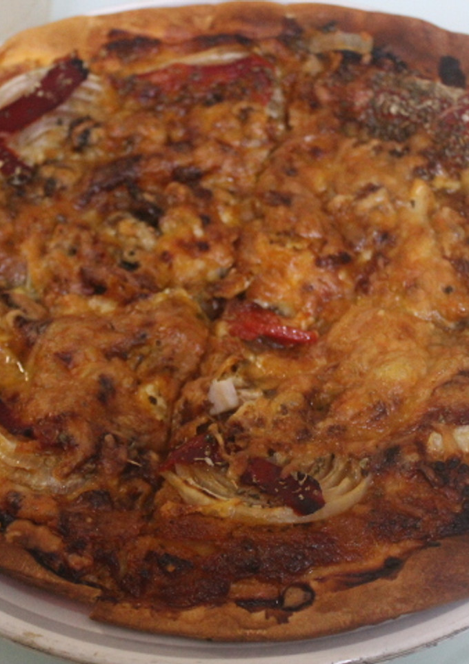 Una foto de Pizza casera de pollo