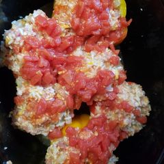 A picture of Cheesy Piggy crockpot stuffed peppers.