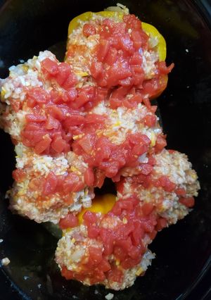 A picture of Cheesy Piggy crockpot stuffed peppers.