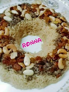صورة لوصفة رز بالخلطة والمكسرات 🍛
