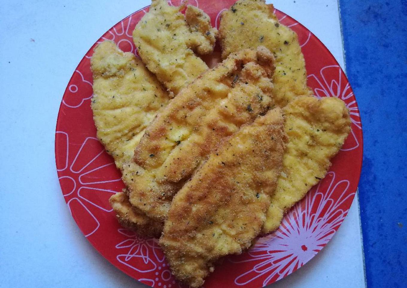 Filetes empanados con ajo y perejil (BLW)