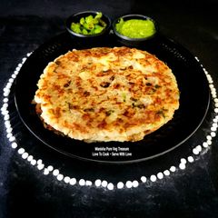 A picture of Sabudana Batata Farali Thalipeeth.