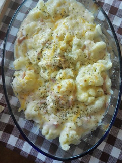 Una foto de Coliflor con bechamel y bacon