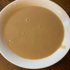 A picture of Brown gravy or chicken gravy.