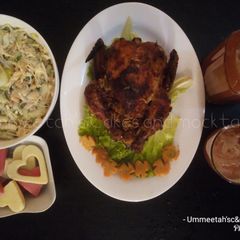 A picture of Grilled chicken stuffed with fried rice,coleslaw&veg.juice(Val).