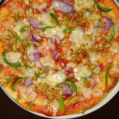 Spicy Tikka pizza A picture of Spicy Tikka pizza.