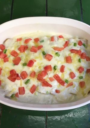 Una foto de Enchiladas blancas