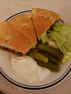 صورة لوصفة عجينه البطبوطه محشيه بالفرن
