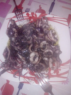 Una foto de Calamares en salsa verde