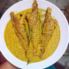 A picture of Bhetki fish in Mustard gravy.