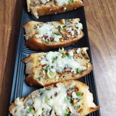 A picture of Cheesy Garlic Bread.