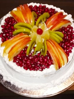 A picture of Eggless Vanilla Fresh Fruit Cake !!.