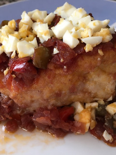 Una foto de Bacalao al vino tinto