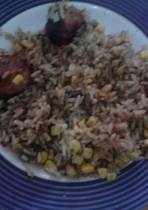 Una foto de Arroz al Fernet