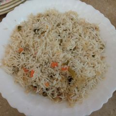 A picture of Egg and vegetable fried rice.