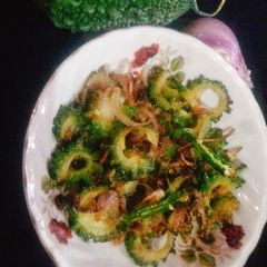 A picture of Korola Bhaji (Stir fried bitter gourd).