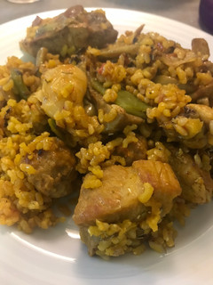 A picture of Valencian Paella with Artichokes, Meatballs, and Brown Rice.