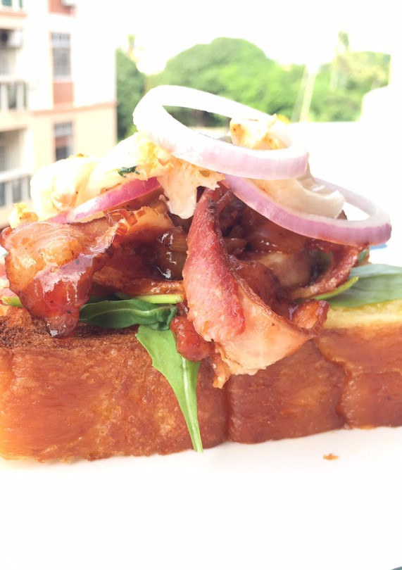 A picture of Bacon And Onion In BBQ Sauce Open Sandwich.