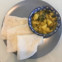 A picture of Amboli (rice crepes for gravies).