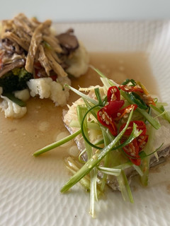A picture of Steam Grouper with Soy sauce.