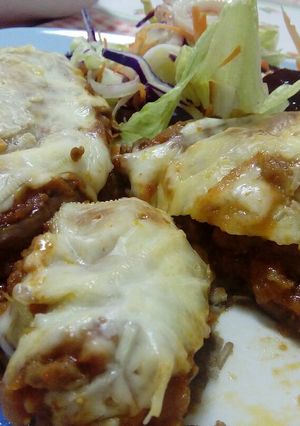 Una foto de Berenjenas rellenas de carne
