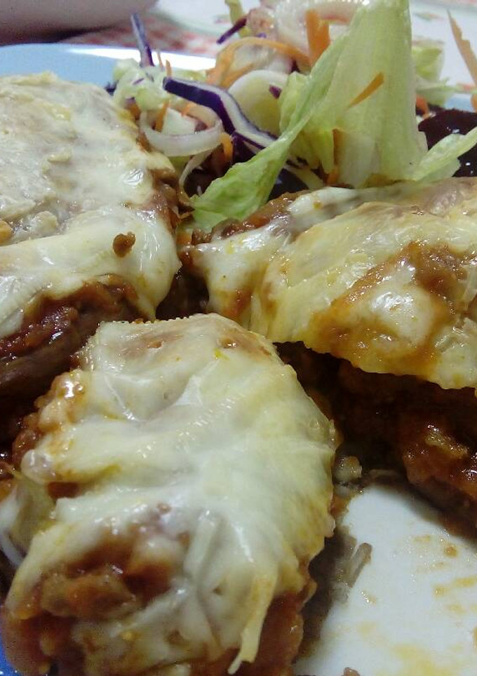 Una foto de Berenjenas rellenas de carne
