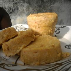 A picture of Palm oil Moin Moin (Beans pudding with Palm oil.).