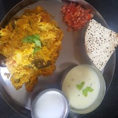 Ringna vatana bateta ni khichdi and kadhi A picture of Ringna vatana bateta ni khichdi and kadhi.