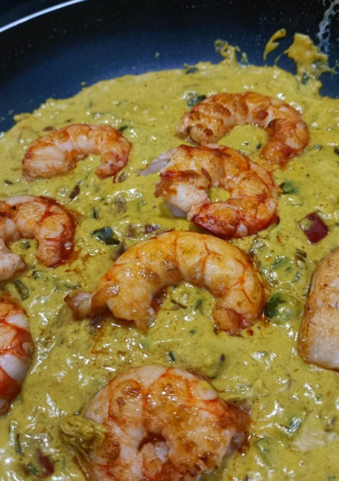 Una foto de Gambones al curry